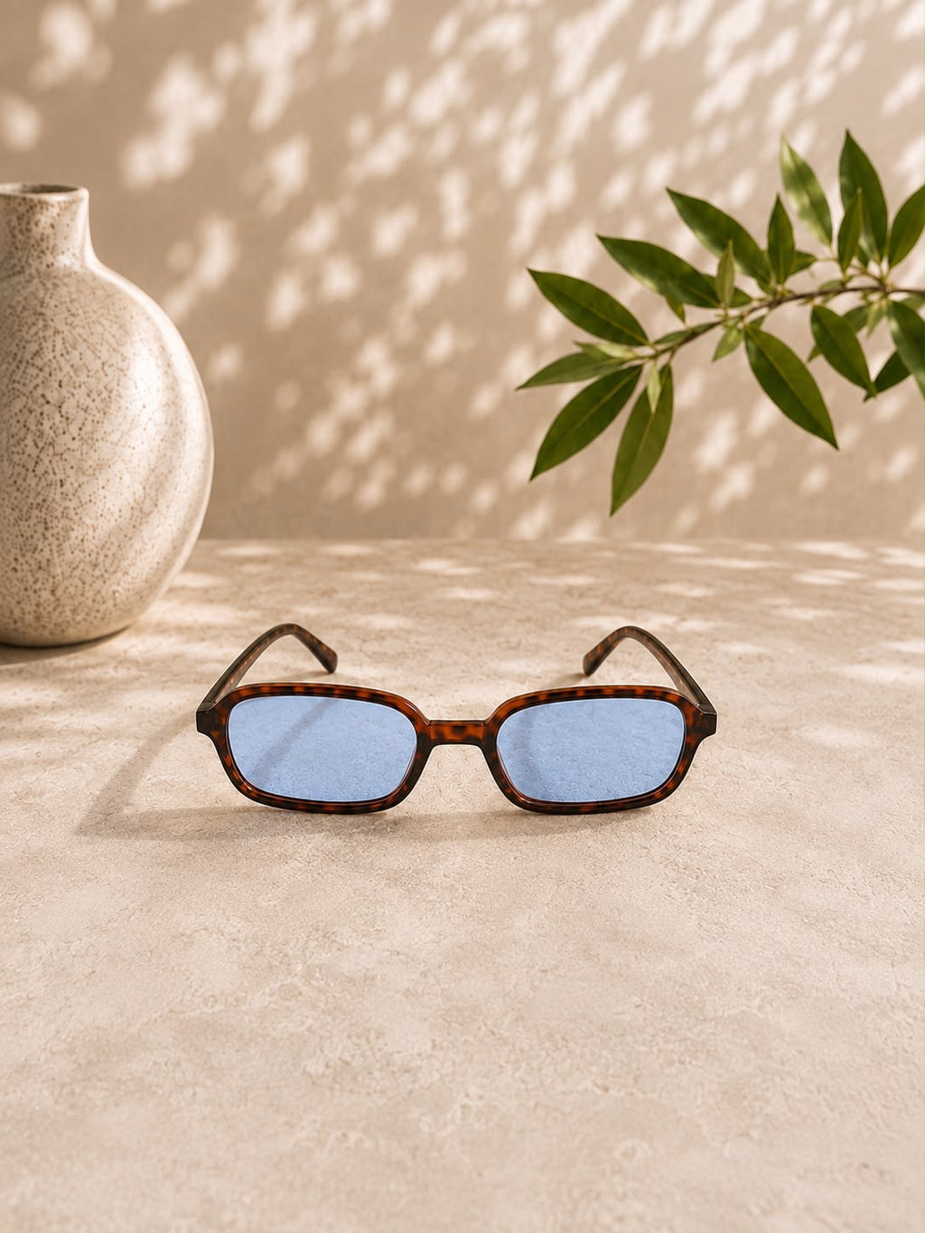 Schmale Retro-Sonnenbrille in Braun Orange Leopardenmuster mit blauen Gläsern