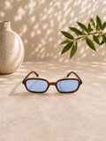 Schmale Retro-Sonnenbrille in Braun Orange Leopardenmuster mit blauen Gläsern